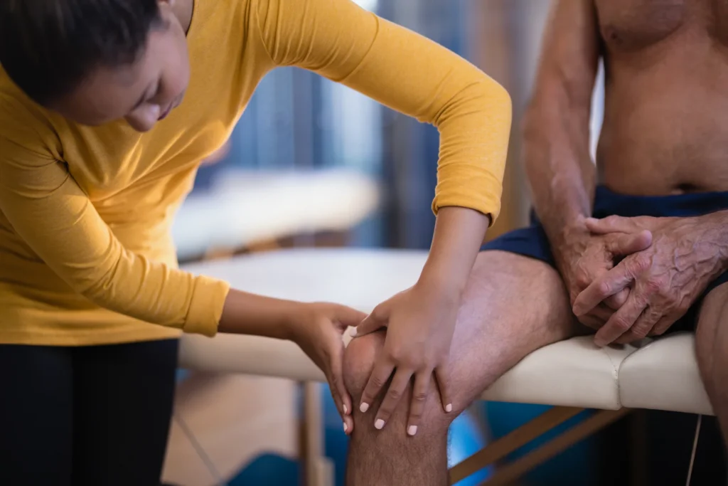 knee exam by health professional at medical office 2026 03 25 01 39 09 utc