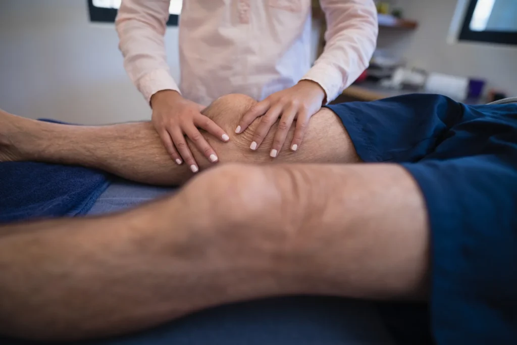 knee massage at therapy session indoors 2026 01 09 08 25 02 utc