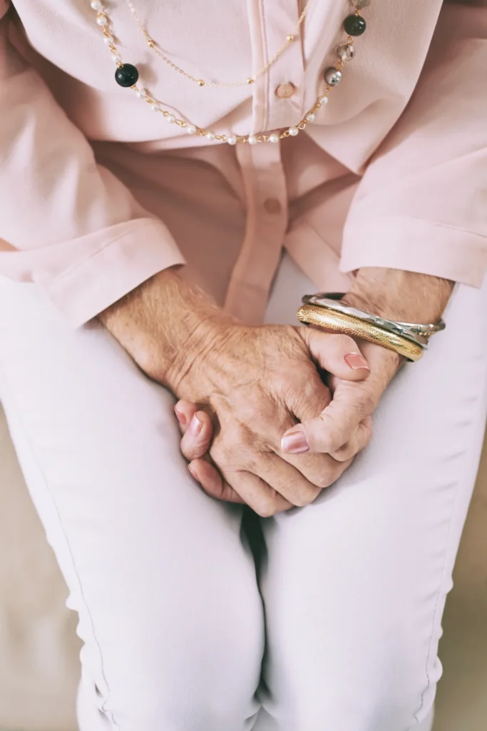 mature woman s hands and jewelry on white backgrou 2026 03 18 05 04 47 utc